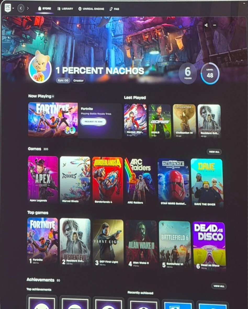 Capture d’écran de l’Epic Games Store affichant la page profil d’un utilisateur nommé “1 PERCENT NACHOS”, avec une bannière illustrée en arrière-plan. En haut, des onglets Store, Library et Unreal Engine. À droite du profil, des indicateurs de niveau 48 et 6 years. Sections “Now Playing” et “Last Played” avec vignettes de jeux dont Fortnite, Marvel Rivals, GOALS, Civilization VI et Resident Evil. Plus bas, une bibliothèque de jeux incluant Apex Legends, Borderlands 4, ARC Raiders, Star Wars Battlefront (titre tronqué), Dave the Diver et d’autres, présentés sous forme de tuiles.