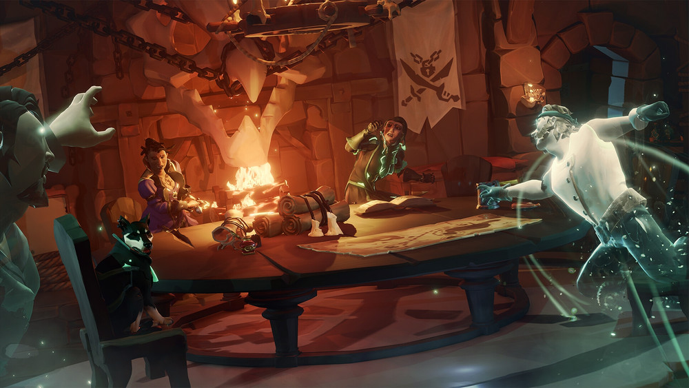Visuel promotionnel de Sea of Thieves montrant plusieurs pirates réunis autour d’une grande table dans une salle en pierre éclairée par une cheminée. Des cartes, parchemins et objets de navigation sont étalés sur la table, tandis que plusieurs fantômes translucides surgissent autour des personnages. Un chien est assis au premier plan et un immense crâne, des chaînes et un pavillon pirate renforcent l’ambiance surnaturelle de la scène.