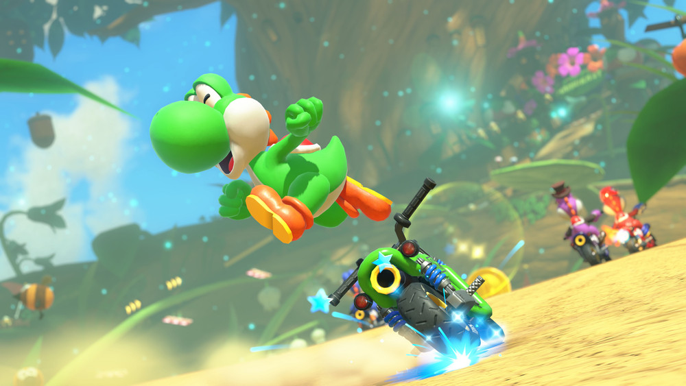 Image tirée du jeu vidéo Mario Kart 8 world, mettant en scène Yoshi, le dinosaure vert emblématique de l’univers Nintendo, projeté dans les airs après un accident de course. Il est représenté dans une pose dynamique, les bras et les jambes tendus, avec une expression de surprise joyeuse sur le visage. Son kart, une moto verte personnalisée, est incliné sur le côté avec des effets de dérapage bleus illustrant une vitesse élevée ou une manœuvre brutale. En arrière-plan, d’autres personnages de la série Mario participent à la course sur un circuit vibrant et coloré inspiré d’un jardin géant, avec des fleurs surdimensionnées, des feuilles, des acorns, des insectes volants et un décor féerique. L’ambiance générale est joyeuse, rapide et ludique, typique du style visuel éclatant de Mario Kart. L’image capture parfaitement l’intensité des courses, les éléments d’action imprévisible et l’univers enfantin et fantastique de la franchise.
