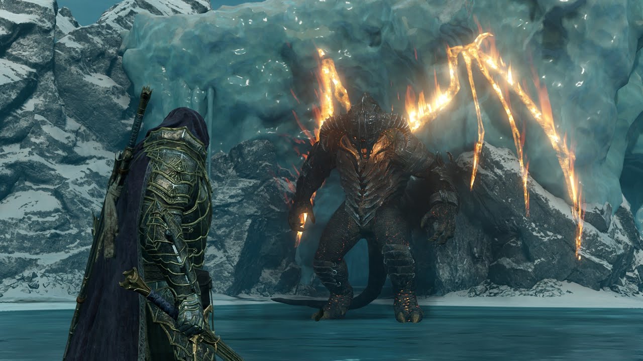 Image issue du jeu La Terre du Milieu : L’Ombre de la Guerre (Middle-earth: Shadow of War), montrant un affrontement imminent entre un guerrier en armure et une créature démoniaque dans un paysage glaciaire. À gauche, un personnage vêtu d’une armure détaillée en métal gravé et d’une cape violette se tient prêt, une épée en main, observant son ennemi. Son apparence noble et préparée évoque un rôdeur ou un seigneur de guerre, déterminé à combattre. En face de lui, une créature massive, reptilienne et noire, au torse recouvert d’écailles, se dresse de manière menaçante. Elle possède deux grandes ailes enflammées aux allures de filaments ardents qui contrastent avec le décor gelé. La bête dégage une aura infernale, accentuée par les éclats de feu qui jaillissent autour de son corps et ses yeux lumineux. L’arrière-plan montre un environnement montagneux glacé, avec de la glace bleutée, de la neige et des roches escarpées, soulignant le contraste entre le froid du lieu et la chaleur destructrice émanant du monstre. Cette scène épique met en lumière les thèmes de conflit entre le feu et la glace, la lutte du bien contre le mal, typiques de l’univers inspiré du Seigneur des Anneaux.