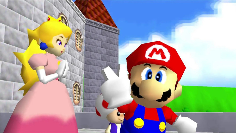 Mario lève la main devant le château de la princesse Peach, visible à gauche avec Toad en arrière-plan, dans une scène en 3D au style graphique de Super Mario 64.