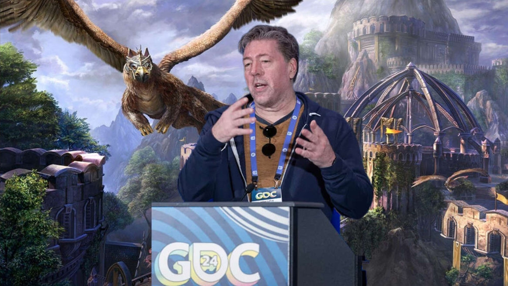 Un homme s'exprimant lors de la Game Developers Conference (GDC 2024), se tenant debout devant un podium avec le logo de l'événement. Il porte une veste bleue, un badge GDC et semble expliquer ou présenter quelque chose avec ses mains. En arrière-plan, une illustration numérique spectaculaire d'un paysage fantastique, incluant un château majestueux et une montagne, est visible, avec un grand aigle en vol au premier plan. L'ambiance visuelle est immersive, évoquant un univers de fantasy, ce qui suggère que la présentation pourrait être liée à un jeu vidéo de ce genre.