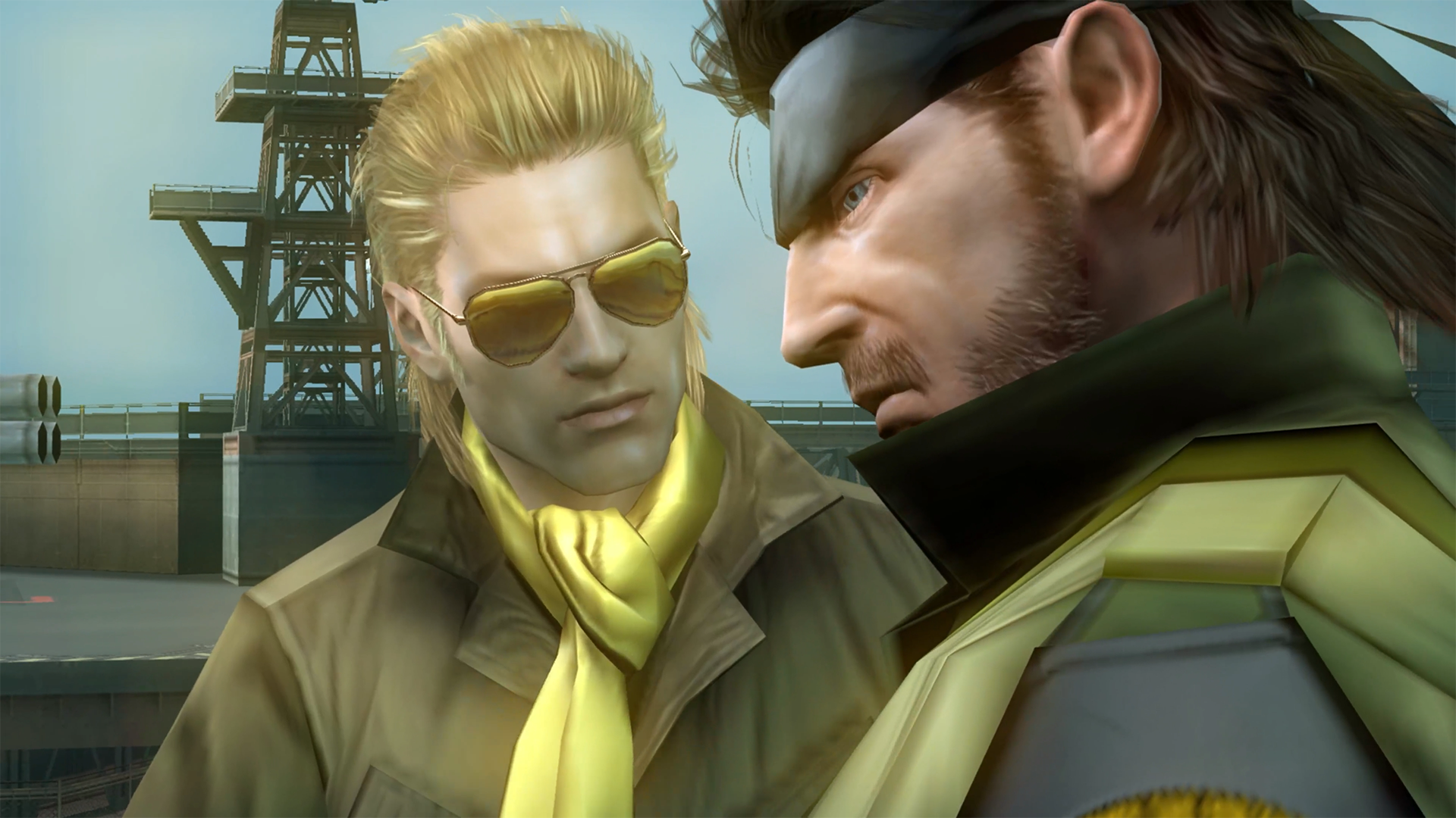 Capture d’écran de Metal Gear Solid montrant deux personnages masculins en gros plan lors d’une scène cinématique sur une plateforme militaire. L’un porte des lunettes teintées et une écharpe jaune, tandis que l’autre, de profil, porte un bandeau et une tenue tactique, créant une ambiance tendue et dramatique.